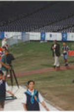 Southern Christian Leadership Conference President Joseph E. Lowery walking on the field at the 1996 Paralympic Games in Atlanta, Georgia.