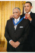 U.S. President Barack Obama presents the Presidential Medal of Freedom to civil rights leader Reverend Joseph E. Lowery during a ceremony in the East Room at the White House on August 12, 2009.