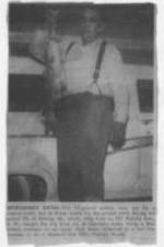 An article about Elmer Lewis holding a 15-pound catfish he caught at Courtney Lake.
