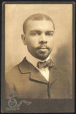 A portrait of James Weldon Johnson as a young adult.