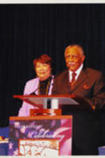 Joseph E. Lowery is shown speaking alongside Evelyn G. Lowery at the 2005 Voting Rights Act Prayer Breakfast.