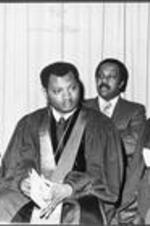 Dr. Robert Threatt (left) - President Morris Brown College, Atlanta GA and Reverend Reginald Jackson - former Turner student (center) with other unidentified men seated.