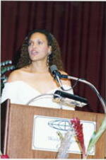 An unidentified woman speaks from the podium at the at the Atlanta Student Movement 20th anniversary event.