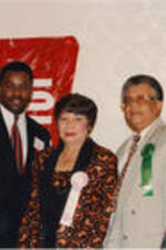 An unidentified man, Evelyn G. Lowery, and Claud Young are shown posing for a picture at the 36th Annual Southern Christian Leadership Conference Convention.