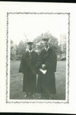 John Hope and unidentified man wearing academic regalia.