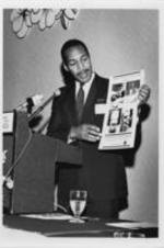 Dr. Huey Mays is shown speaking at the 1st National Conference on AIDS and the Black Community. For more details on the conference, see pages 42-45 of the August-September 1986 SCLC Magazine: http://hdl.handle.net/20.500.12322/auc.199:07030.