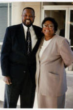 Bennie Mitchell &amp; Angelin Simmons stand shoulder to shoulder at an ITC Grand Reunion. Written on verso: ITC Grand Reunion 1994. Bennie Mitchell, Angelin Simmons.