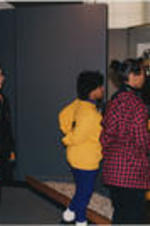 Evelyn G. Lowery is shown with Brenda Davenport and tour participants viewing an exhibit at the George Washington Carver Museum during the SCLC/W.O.M.E.N. Civil Rights Heritage Tour.