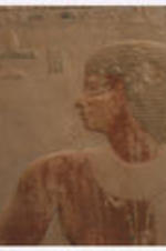 The profile of a man with hieroglyphics.