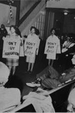 View of three women with picket signs.