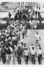 Leadership members of the Southern Christian Leadership Conference, including John Nettles, Joseph E. Lowery, Evelyn G. Lowery, and Spiver Gordon, lead demonstrators in a march prompted by the killing of the Russaw brothers in Eufaula, Alabama.