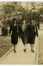View of two Spelman Graduates in the Women's Army Auxiliary Corps with President Florence Matilda Read. Written on verso: Spelman College grads in WAAC.