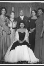 Mattiwilda Dobbs seated with her family around her.