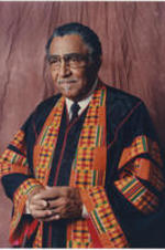 A portrait photo of Joseph E. Lowery in a kente cloth clergy robe.
