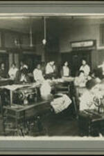 Unidentified female students in sewing class.