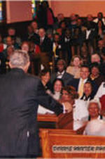 Joseph E. Lowery is shown speaking at a church.