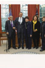 Joseph E. Lowery, Evelyn G. Lowery, Karen Lowery, and Cheryl Lowery pose for a photo with President Barack Obama in the Oval Office of the White House.