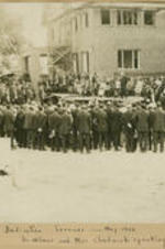 A crowd gathers outside for the dedication service of the Chadwick Home. Written on recto: Dedication services, May 1926. Dr. Wilmer and Miss Chadwick speaking.