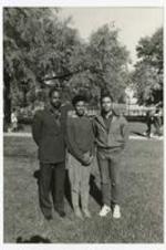 Outdoor group portrait. Written on verso: "Criminal Justice Club; L to R Dr. Tyrone Price, Teresa Bryant, Robert Butts".