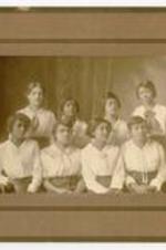 Group portrait of Spelman Teachers Professional Course commencement in 1916. Written on verso: Top row left Willa Golson. Bottom row 3rd from left Inez Brockway.