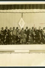 Vivian Wilson Henderson and relative J.J. Henderson with members of the Kappa Alpha Psi Fraternity.