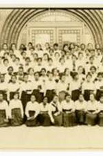 Group portrait of Spelman Seminary High School class of 1920 and 1921. Written on verso: H.S. classes of 1920 and 1921. Mrs. Kurrelmeyer, principal, at far right, fourth row.