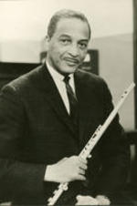 Portrait of Wayman Carver holding his flute.