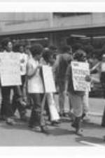 People march through Atlanta as part of the Sanitation Worker's Strike. Written on accompanying document: The 36 day strike of city sanitation workers demonstration, downtown Atl.