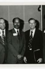 President Hugh Gloster with Sam Nunn, Louis Sullivan, Maynard Jackson, and a unidentified person.
