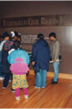 Civil Rights Heritage Tour participants are shown viewing an exhibit at the Birmingham Civil Rights Institute.