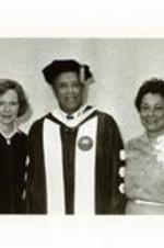 Written on verso: (L-R) Mrs. Carter, Dr. Gloster and Mrs. Gloster Commencement 1980.